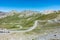 Panoramic shot of Col Agnel mountain pass between France and Italy with tourist cars