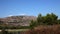 Panoramic shot of the dalmatian nature with a hill with windmills in behind