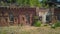 Panoramic shot of dilapidated building from red brick