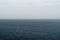 Panoramic shot of a foggy ocean