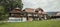 Panoramic shot of a house with a pool in the countryside in Slovenia