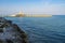 Panoramic shot of the islet of Santa Eufemia with the Vieste lighthouse in Apulia, Italy