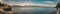 Panoramic shot of the lake in the Stanley Park in Vancouver with the view of Lions Gate Bridge