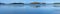 Panoramic shot of natural scenery with blue water on MacKenzie Beach in Tofino, Canada