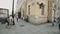 Panoramic shot of old city street at corner of old architecture style building