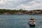 Panoramic shot of the old town Istanbul; The Hagia Sophia Ayasofya Mosque Eminonu, ferries and boats on the Golden Horn,