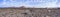 Panoramic shot of the rugged lava landscape with the volcanoes on Lanzarote, Spain