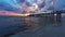 A panoramic shot of a scenic colorful sunset at the beach - Naples Pier, Florida