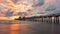 A panoramic shot of a scenic colorful sunset at the beach - Naples Pier, Florida, USA