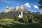 Panoramic shot of a the st. valentin church with the Schlern mountain in the background in Italy