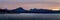 Panoramic shot of the sunset over the lake in the Torridon village, Highlands, Scotland