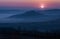 Panoramic shot of the sunset in the pastel-colored sky in Istria with a city Motovun in Croatia