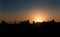 Panoramic silhouette of a big city at sunset. Kiev