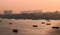 Panoramic silhouette of surat city while sun rising near ONGC bridge