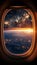 Panoramic sky horizon view through airplane window for breathtaking aerial scenery