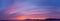 Panoramic sky of a sunset full of clouds