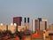 panoramic skyline view of buildings in leeds looking towards the university area showing towers chimneys apartment buildings and