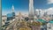 Panoramic skyline view of Dubai downtown with mall, fountains and skyscrapers aerial timelapse