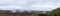 Panoramic snowy mountain range and cloud cover