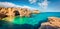 Panoramic spring view of popular tourist attraction - Torre Sant`Andrea. Sunny morning seascape of Adriatic sea, Torre Sant Andre
