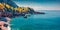 Panoramic spring view of publik beach in Dhermi town. Deep blue water in Adriatic sea.