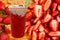 Panoramic still life of ice cream slush frozen colorful frozen fruit granita drinks flowing into takeaway plastic cups with ice