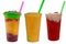 Panoramic still life of ice cream slush frozen colorful frozen fruit granita drinks flowing into takeaway plastic cups with ice