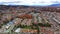 Panoramic of the streets, parks and buildings of the city of Bogota colorful sunset between the trees and green meadows