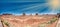 Panoramic sunet view of Monument Valley scenario from visitor ce