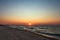Panoramic sunset sky background. Summer beach of panoramic view. Ocean wave. Colorful seascape, beach. Sunrise by the sea. Horizon