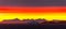 Panoramic sunset of vibrant reds, oranges and yellows with iceberg and mountains along arctic Greenland coast