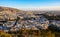 Panoramic sunset view of Athens, Greece, with Panathenaic Stadium, and Piraeus at Saronic Gulf of Aegean sea in background seen