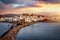 Panoramic sunset view of the city and port of Naxos island