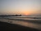 Panoramic sunset view of Huanchaco pier at pacific ocean sea sand beach Trujillo La Libertad Peru South America