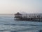 Panoramic sunset view of Huanchaco pier at pacific ocean sea sand beach Trujillo La Libertad Peru South America