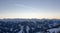 Panoramic sunset view Saalbach hinterglemm snowy mountains chemtrail sunset sky from plane