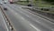 Panoramic timelapse passing city traffic cars bridge, daytime