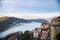 Panoramic top view of Alps mountains in fog and clouds