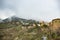 Panoramic top view of Alps mountains in fog and clouds