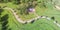 Panoramic top view green city park with large Tai Chi circle Yin