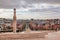 Panoramic top view of Mount Ararat in cirrus clouds, Cascade and Yerevan city at sunrise over roofs, Yerevan, Armenia