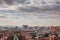 Panoramic top view of Mount Ararat in cirrus clouds, Cascade and Yerevan city at sunrise over roofs, Yerevan, Armenia