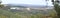 Panoramic of the town of Jabugo between chestnut trees, cork oaks and holm oaks in the Sierra de Aracena, Huelva. Spain