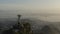 Panoramic, tracking view of Christ the Redeemer during sunrise over Corcovado Mountain in Rio de Janeiro