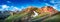 Panoramic true Icelandic landscape view of colorful rainbow volcanic Landmannalaugar mountains, red and pinky volcanic crater and