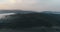 Panoramic video of dreamy foggy valley during sunrise.