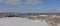 Panoramic view on Alexandra Interprovincial bridge over frozen Ottawa river on winter day with snow