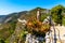 Panoramic view of Alpes rocky coastline with Avenue Bella Vista route at Mediterranean Sea seen from town of Eze in France