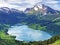 Panoramic view of the Alpine lake Wagitalersee Waegitalersee, the Wagital or Waegital valley, and the peaks Turner and Diethelm