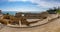 Panoramic view of the ancient roman amphitheater of Tarragona next to the sea